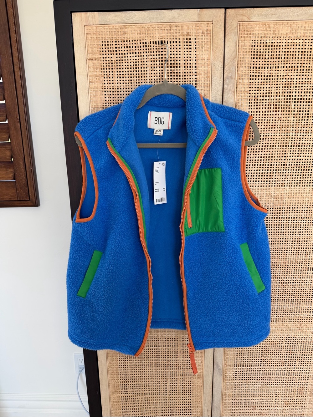 BDG Bright Blue Sherpa Vest with Green Panels and Orange Trim